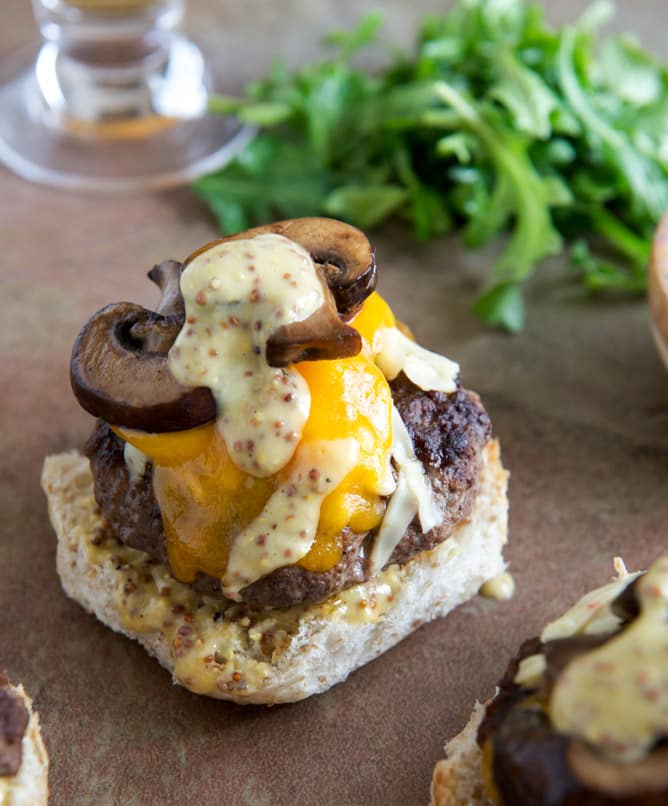 Cheeseburgers with Sautéed Mushrooms, Arugula and Dijon Aioli I howsweeteats.com Cheeseburgers with Sautéed Mushrooms, Arugula and Dijon Aioli I howsweeteats.com