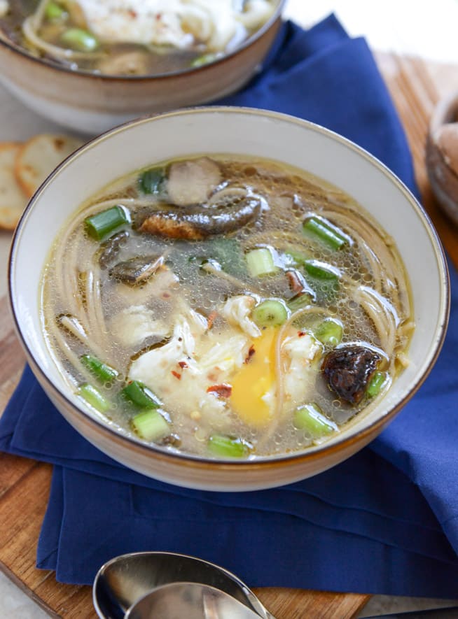 Chicken + Mushroom Noodle Soup with Poached Eggs I howsweeteats.com Chicken + Mushroom Noodle Soup with Poached Eggs I howsweeteats.com
