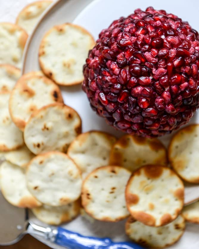 Pomegranate Jeweled White Cheddar, Toasted Almond and Crispy Sage Cheeseball I howsweeteats.com Pomegranate Jeweled White Cheddar, Toasted Almond and Crispy Sage Cheeseball I howsweeteats.com