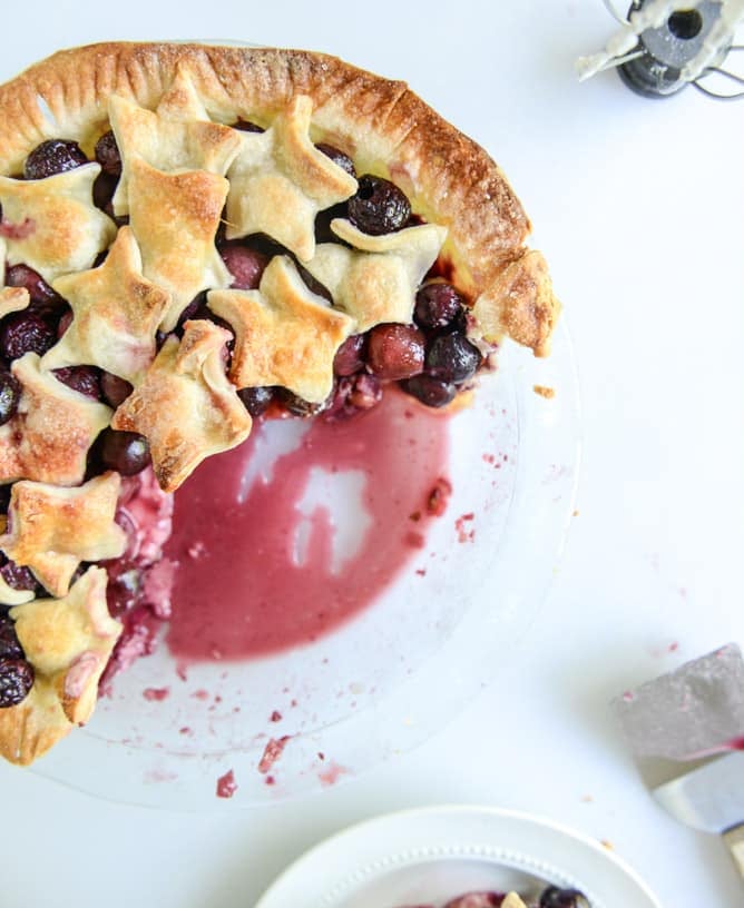 sweet cherry pie with amaretto whipped cream I howsweeteats.com
