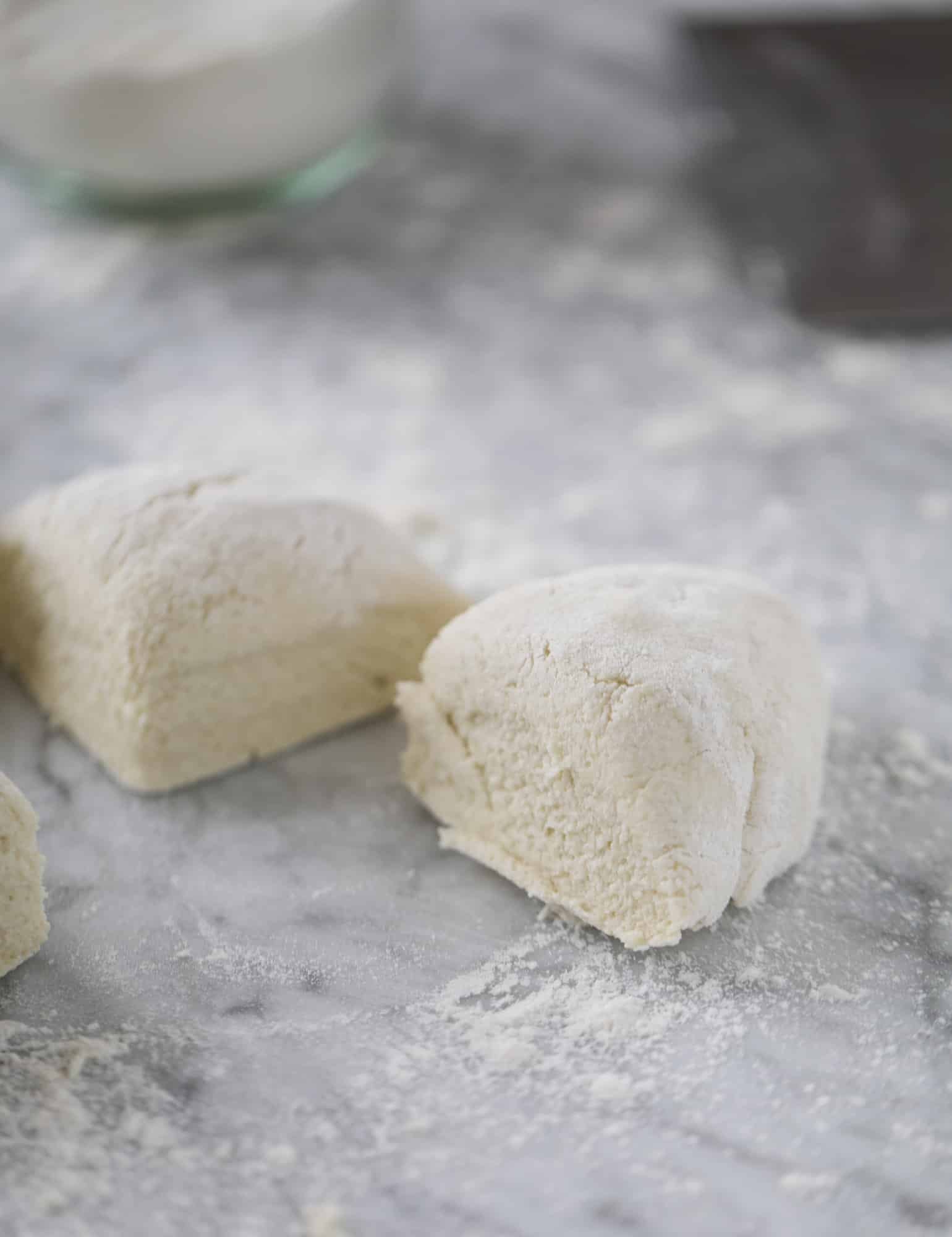 Homemade cauliflower gnocchi that tastes just like the Trader Joe's version! It's made with cauliflower, comes together fast and is super easy! I howsweeteats.com #cauliflower #gnocchi