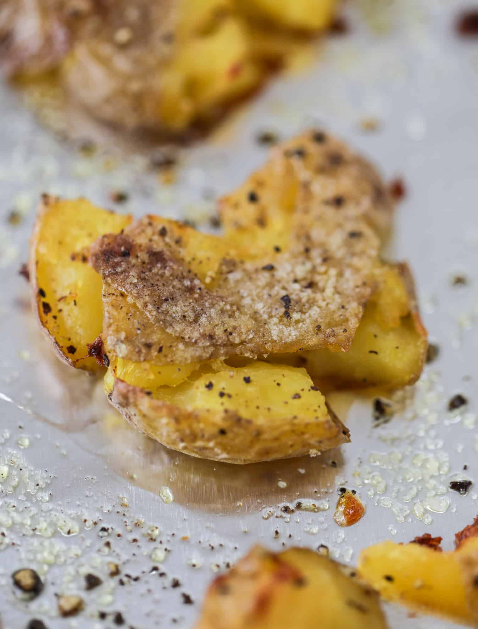 This is our favorite side dish ever! Crispy smashed potatoes roasted in the oven to perfection. Serve them with a dipping sauce or as a side dish!