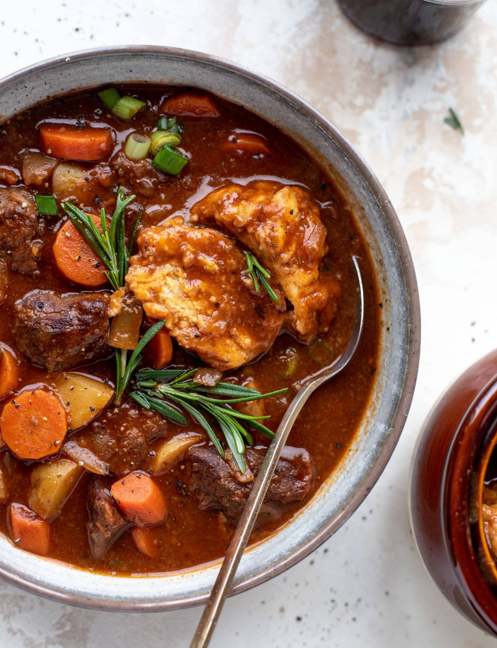 My new favorite soup! Irish stout beef stew is flavorful and hearty and topped with delicious herb dumplings. Perfect comfort food.