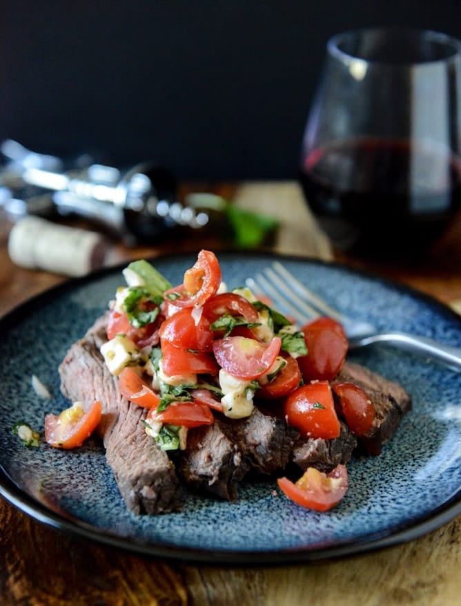 Red Wine Marinated Flank Steak with Cherry Tomato Caprese Salsa I howsweeteats.com