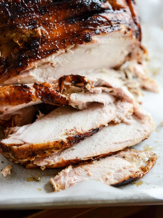 this applewood smoked turkey is prepped with a maple bourbon brine and served with a cider bourbon gravy! I howsweeteats.com
