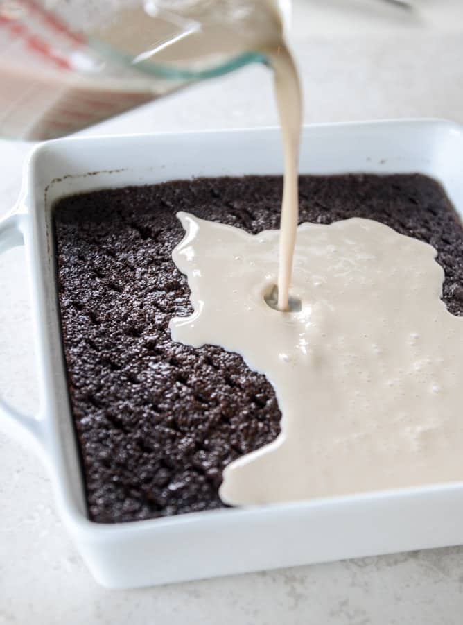 This chocolate tres leches cake is a spin on the classic tres leches. Three milks, one being chocolate milk, soak into the fudgiest cake ever! I howsweeteats.com