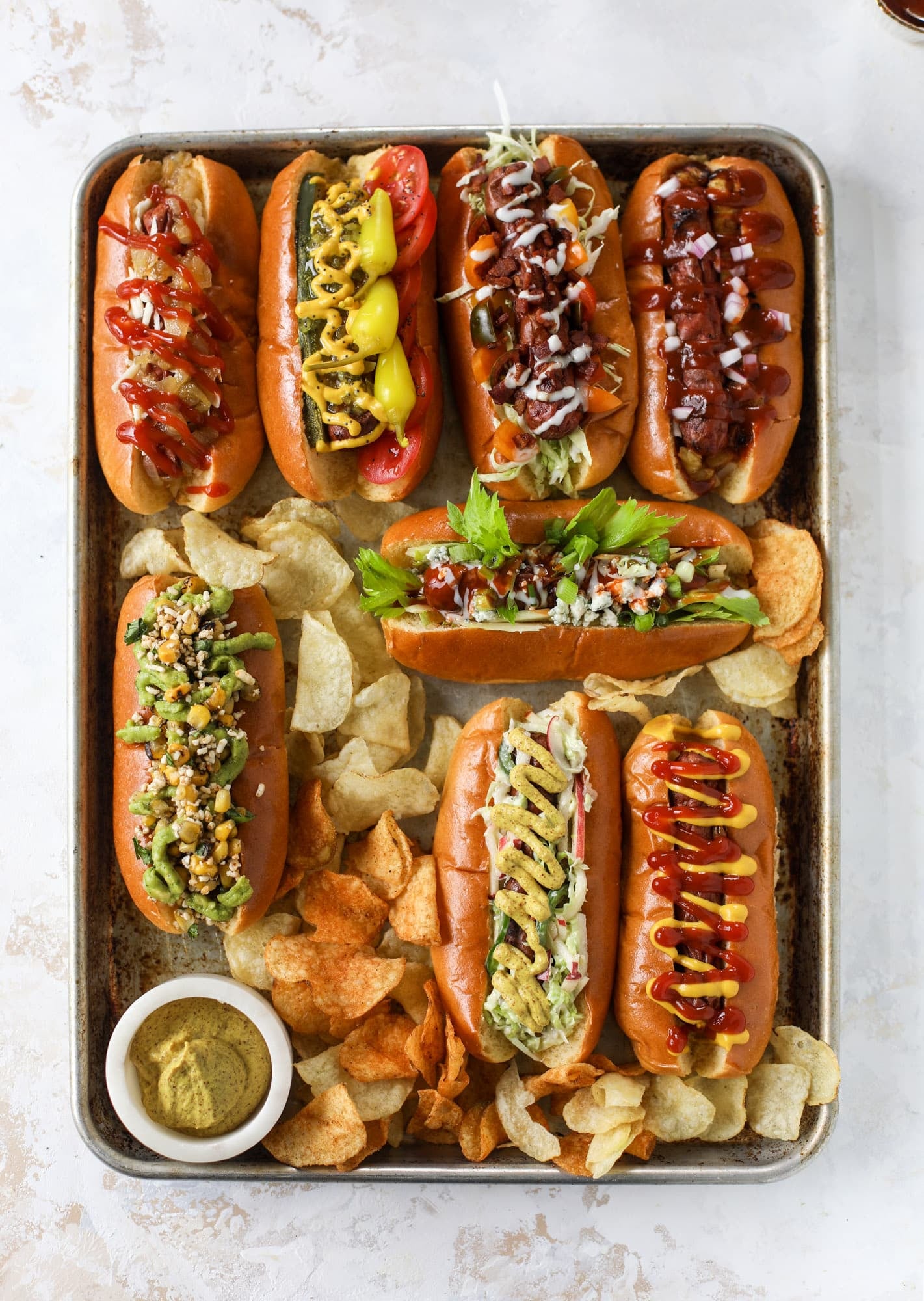 Nothing screams summer more than a hot dog bar! Grab your buns and dogs and a whole lot of toppings. This is super fun and delicious!
