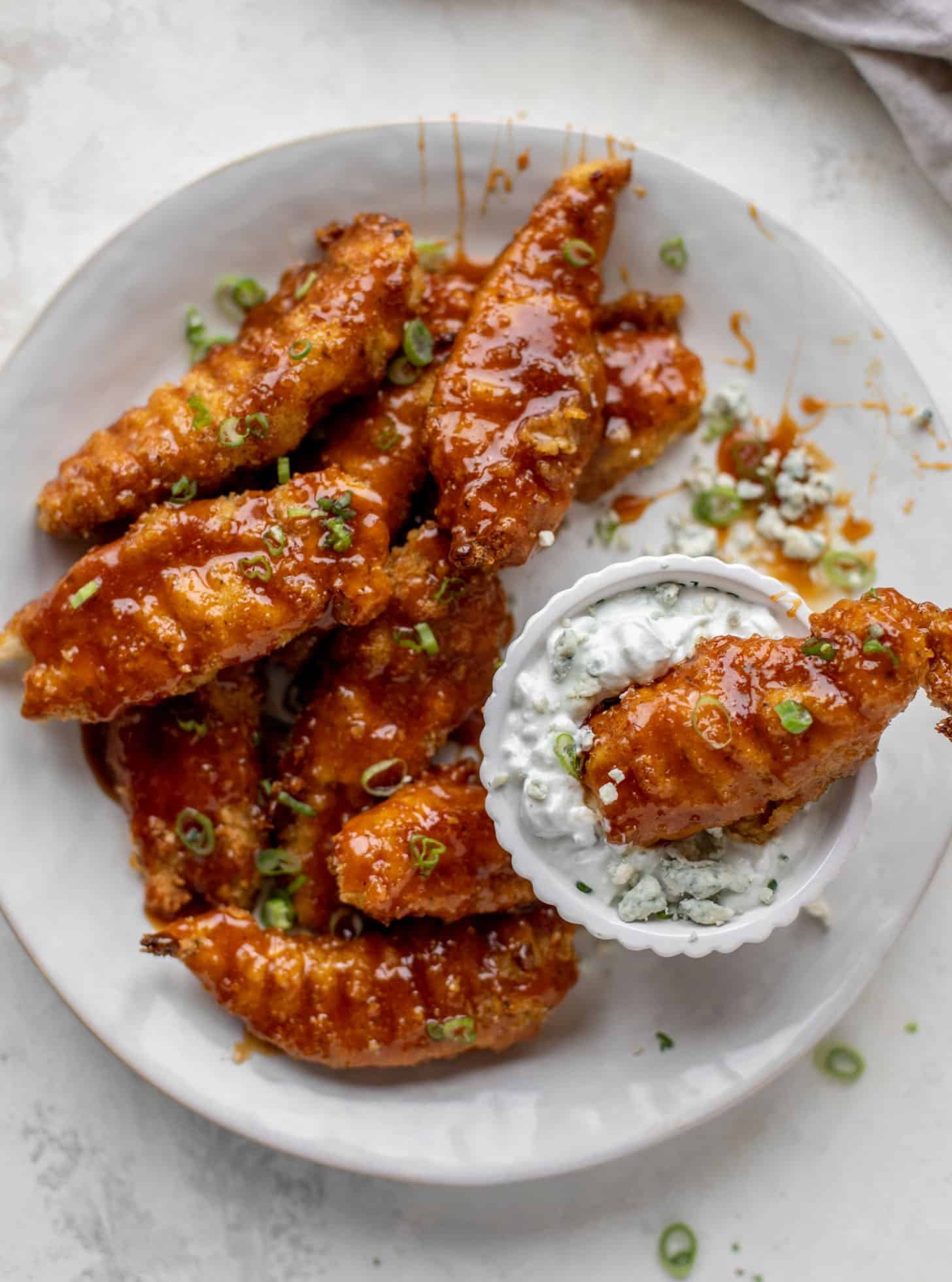 sticky chicken fingers with yogurt blue cheese sauce