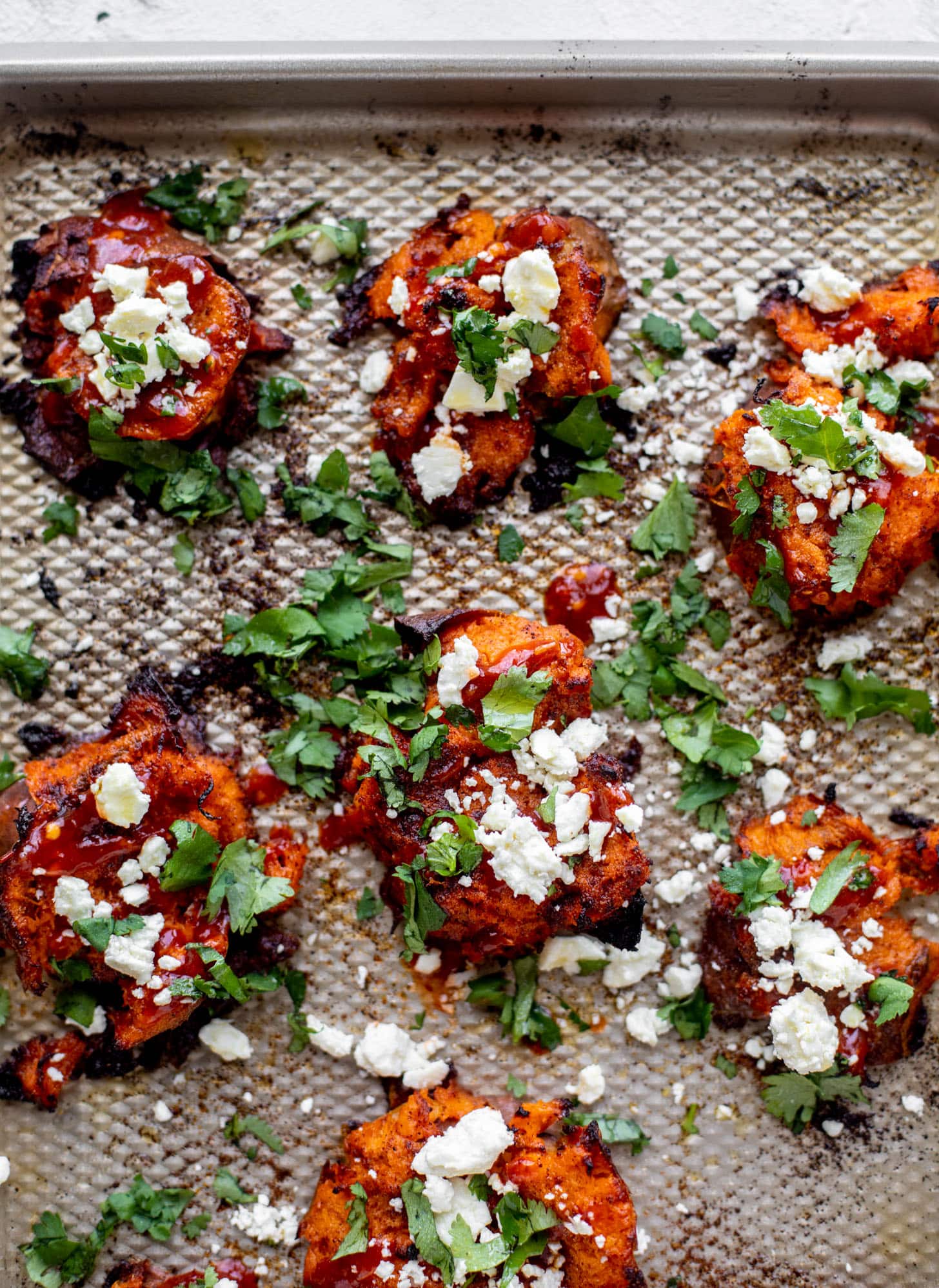 crispy smashed chili sweet potatoes