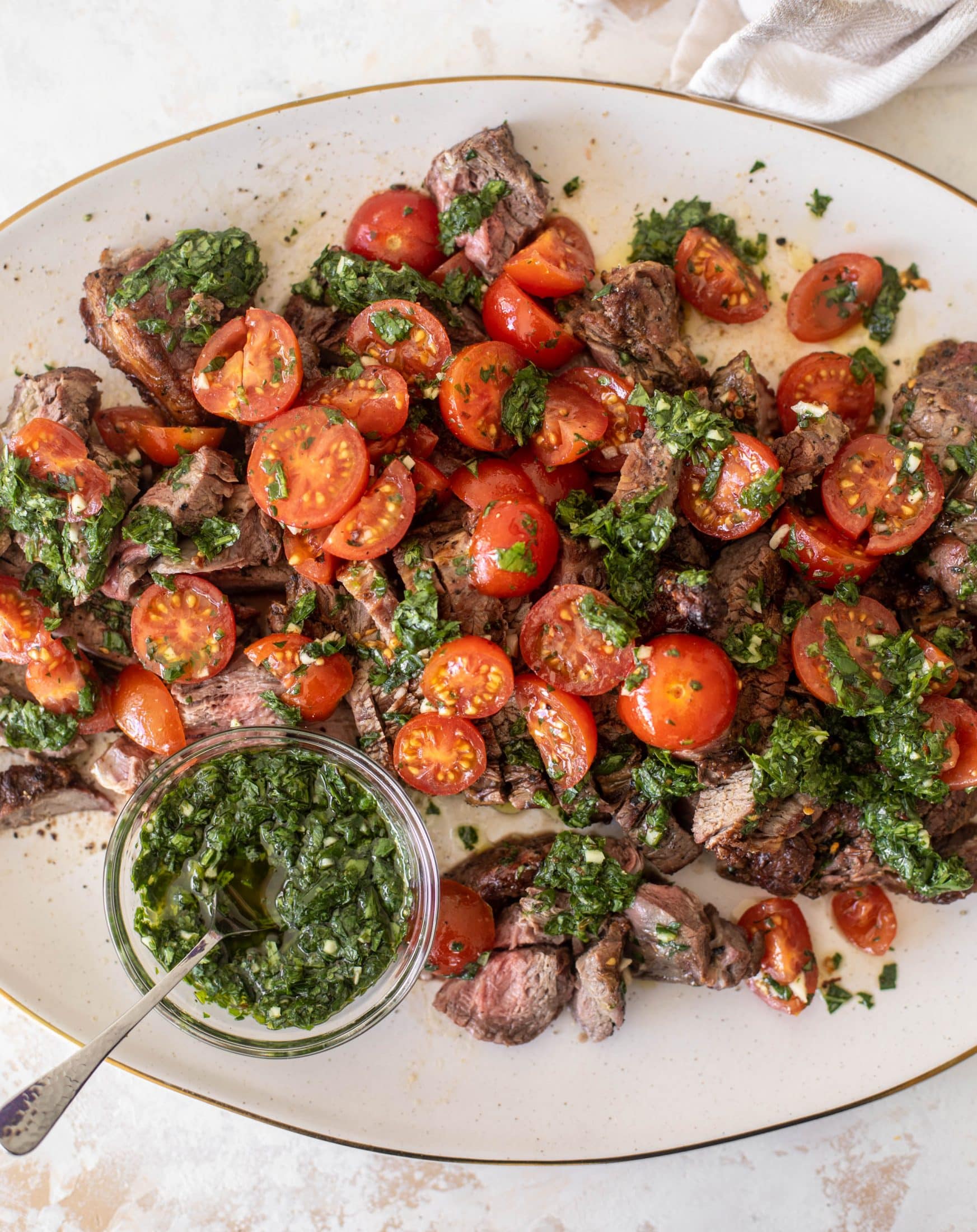 grilled steak with spicy marinated tomatoes