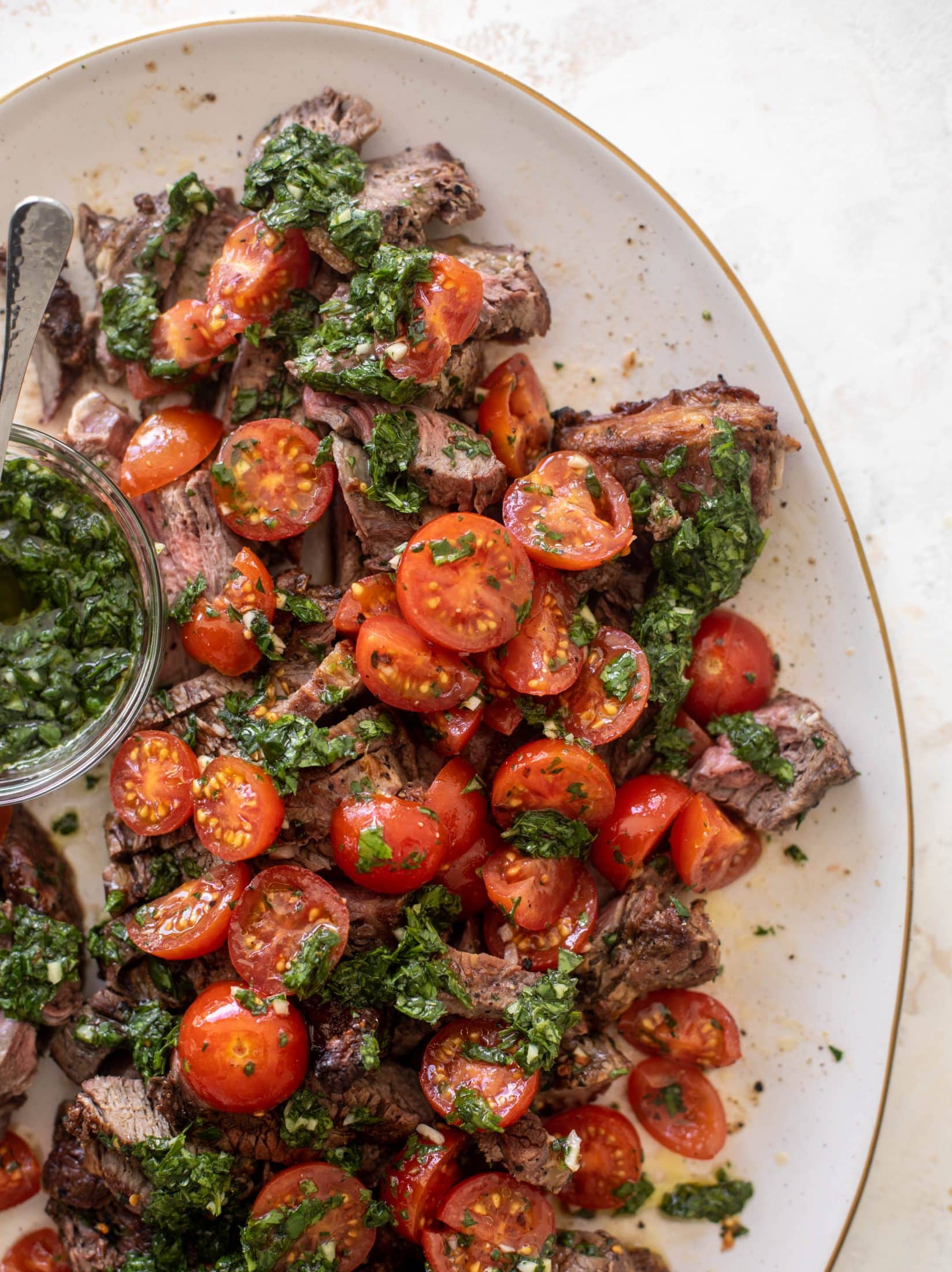 grilled steak with spicy marinated tomatoes